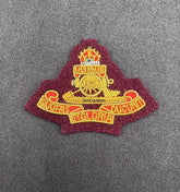 King’s Crown Royal Artillery Officers Beret Badge RA Maroon Background Cap Badge