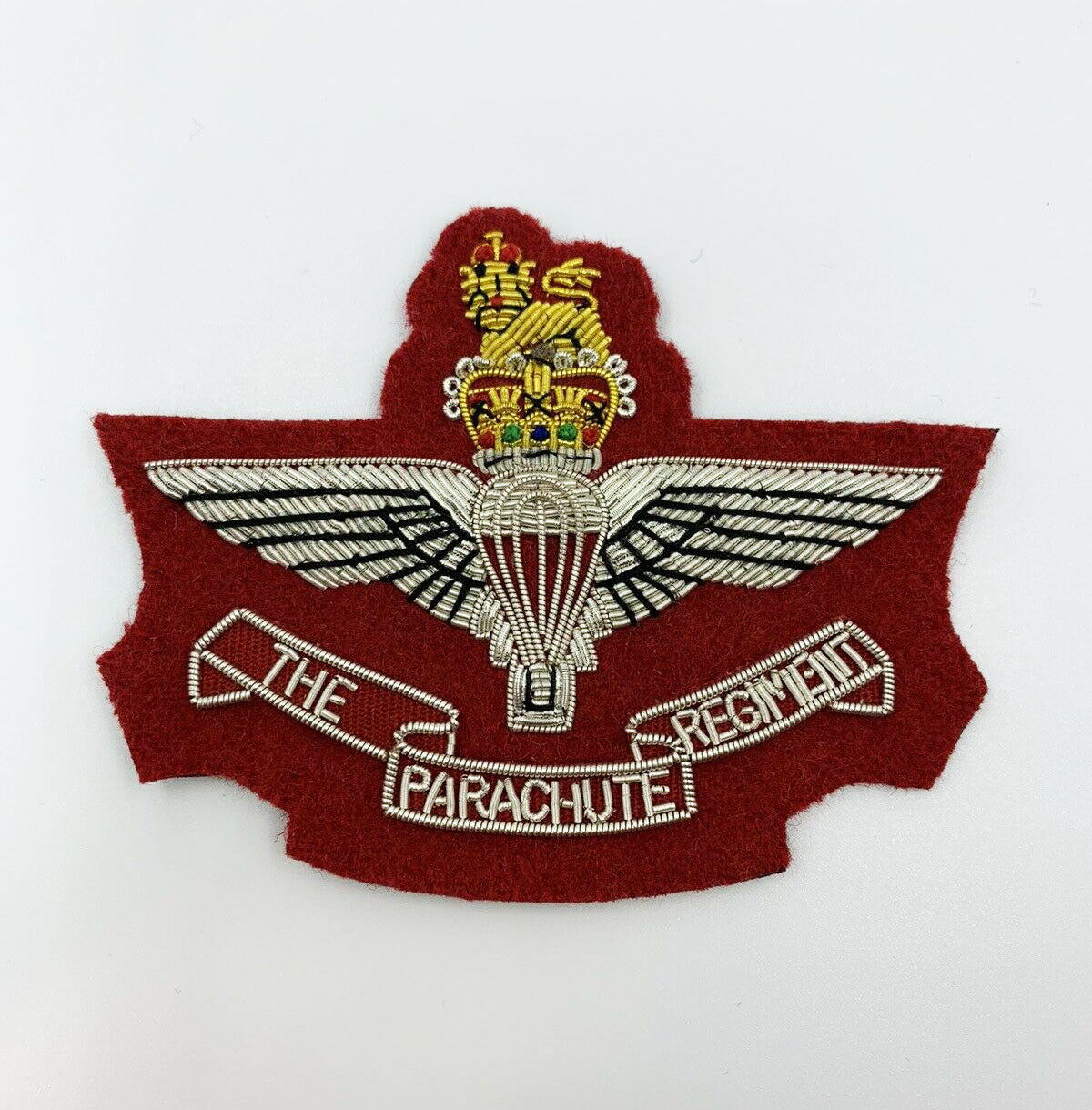 The Parachute Regment On Maroon Cloth With Silver Wire And Bullion Blazer Badge