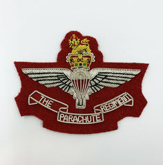 The Parachute Regment On Maroon Cloth With Silver Wire And Bullion Blazer Badge